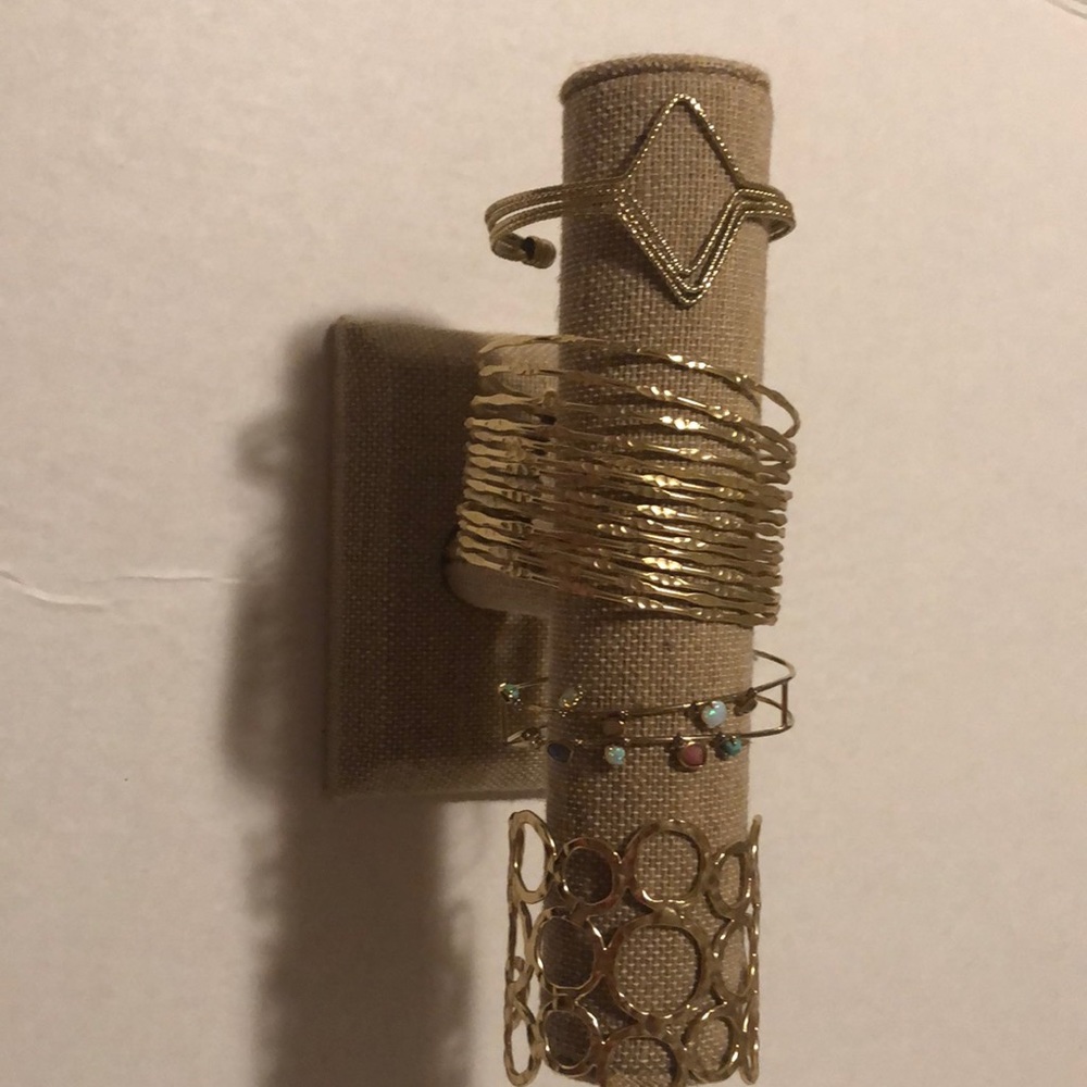 4 gold bangle bracelets from Anthropologie.
